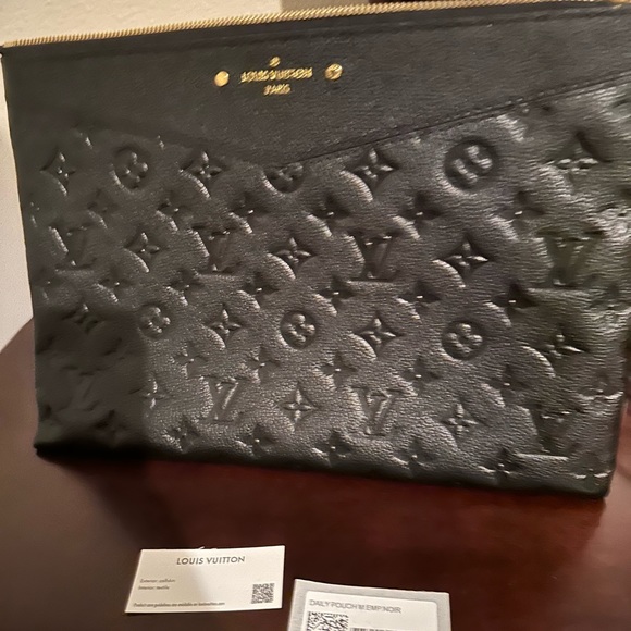 LV daily pouch Monogram Empreinte Leather